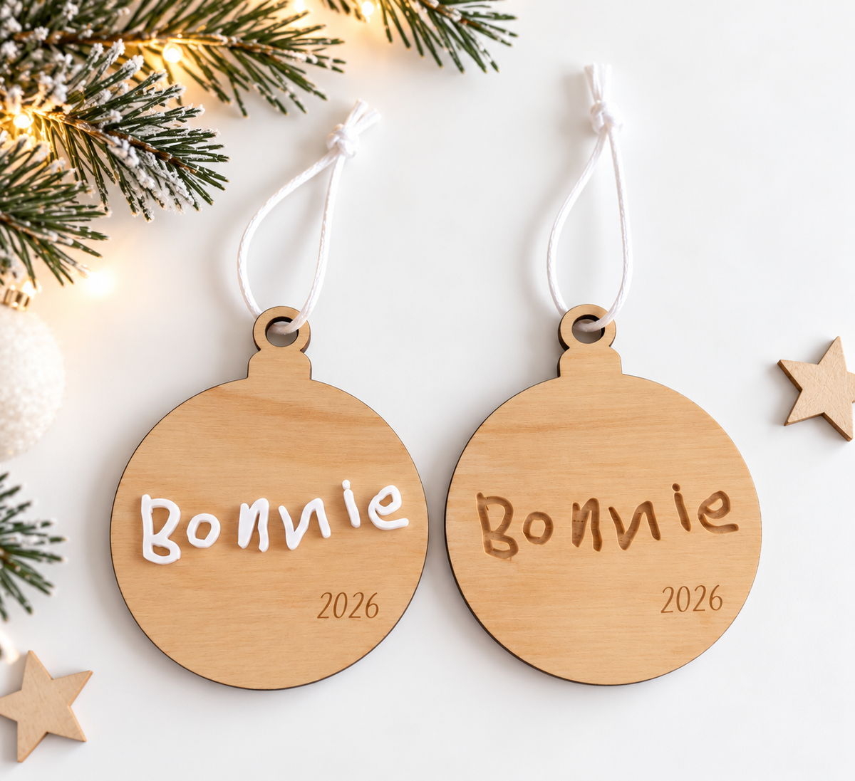 Personalised wooden Christmas baubles featuring child's original handwritten name Bonnie, in engraved timber and raised white acrylic options, handmade by Ally May Creations.