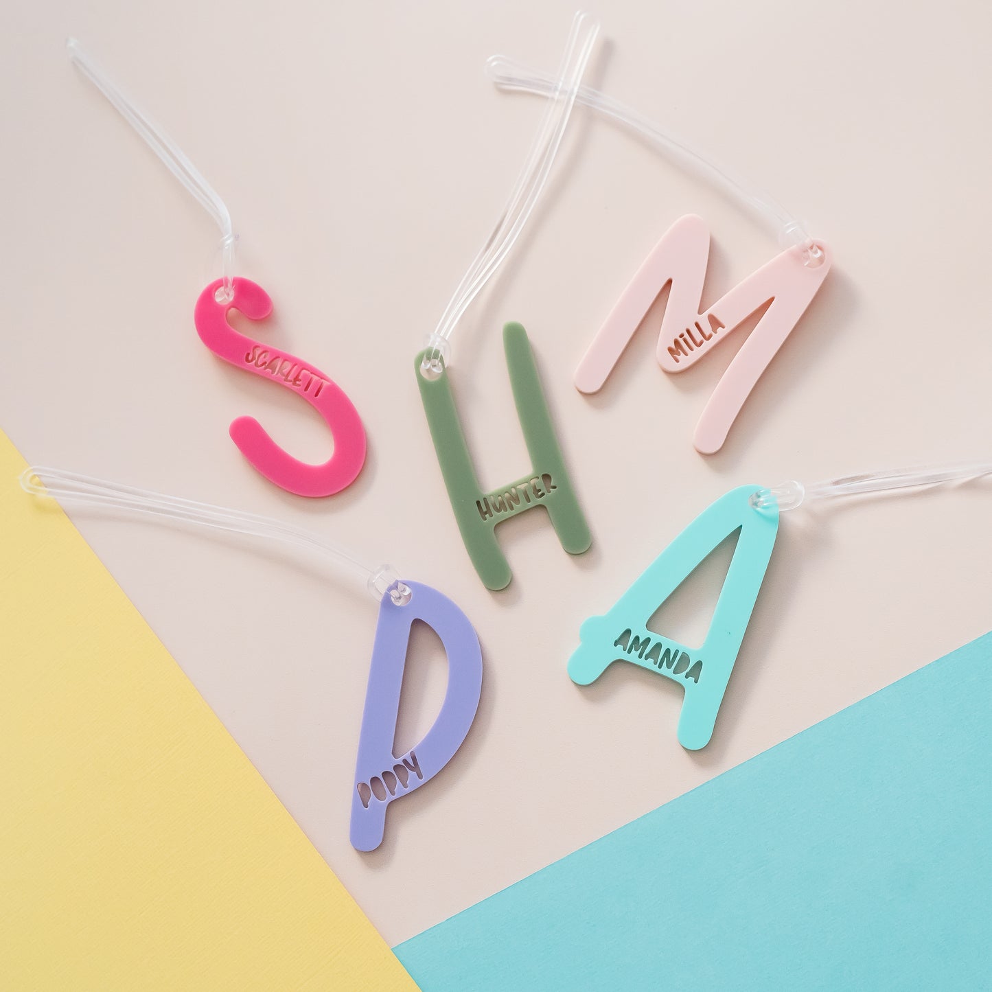 Acrylic letter initial bag tag