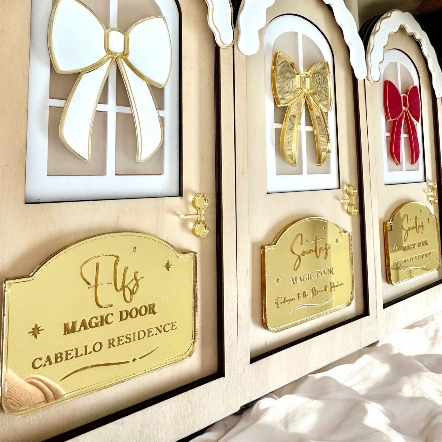 decorative christmas personalised for the family with a bow