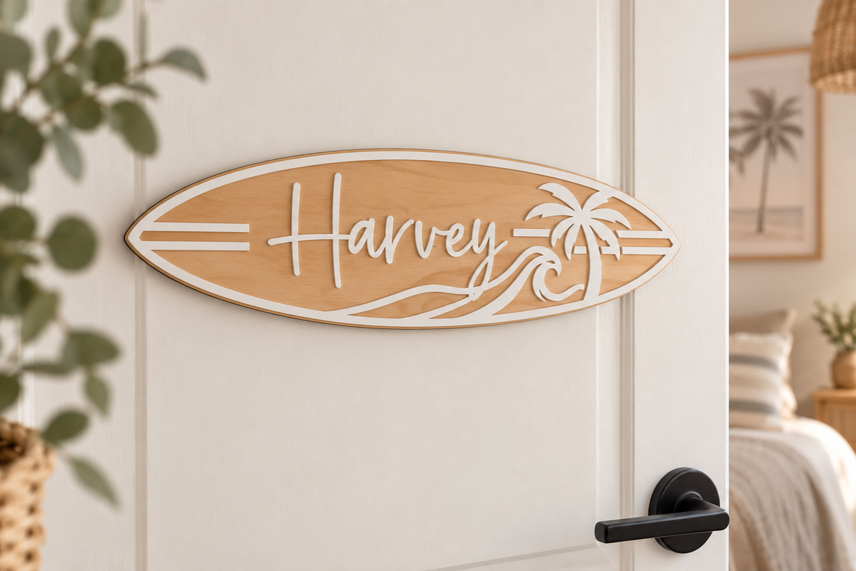 Personalised timber surfboard name sign with white acrylic palm tree and ocean wave