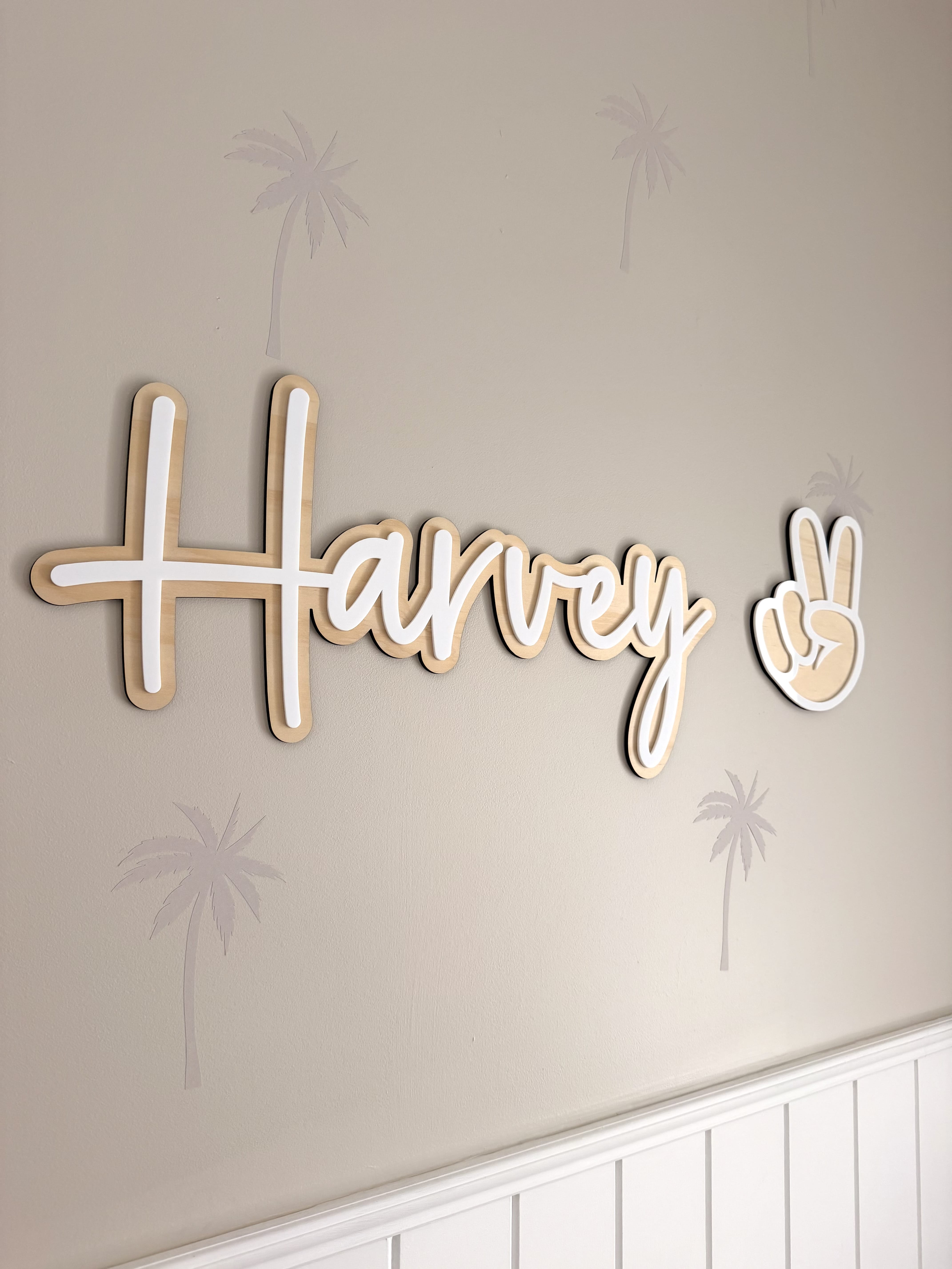 personalised timber name sign white acrylic lettering nursery decor name Harvey on a beige background 