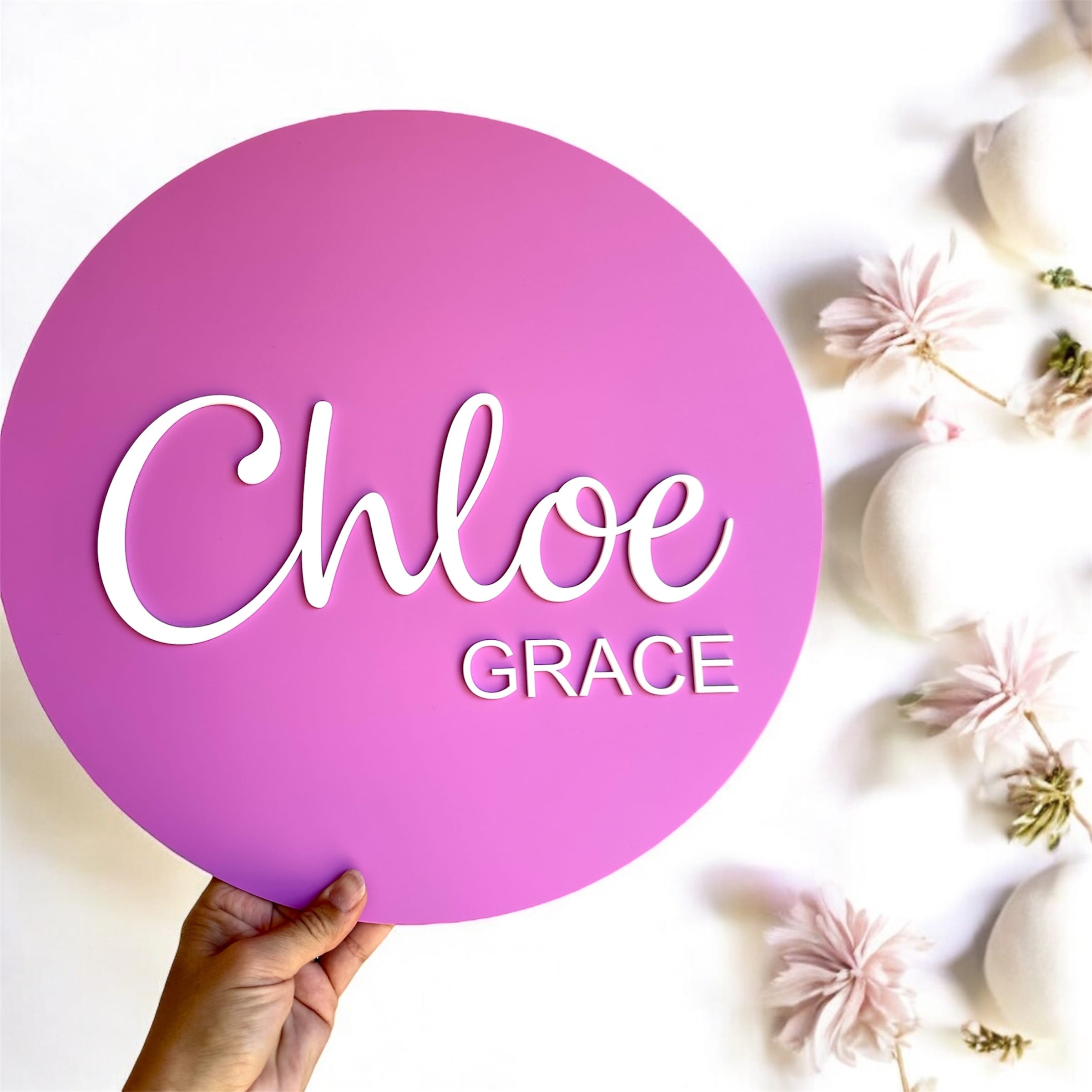Purple round name sign